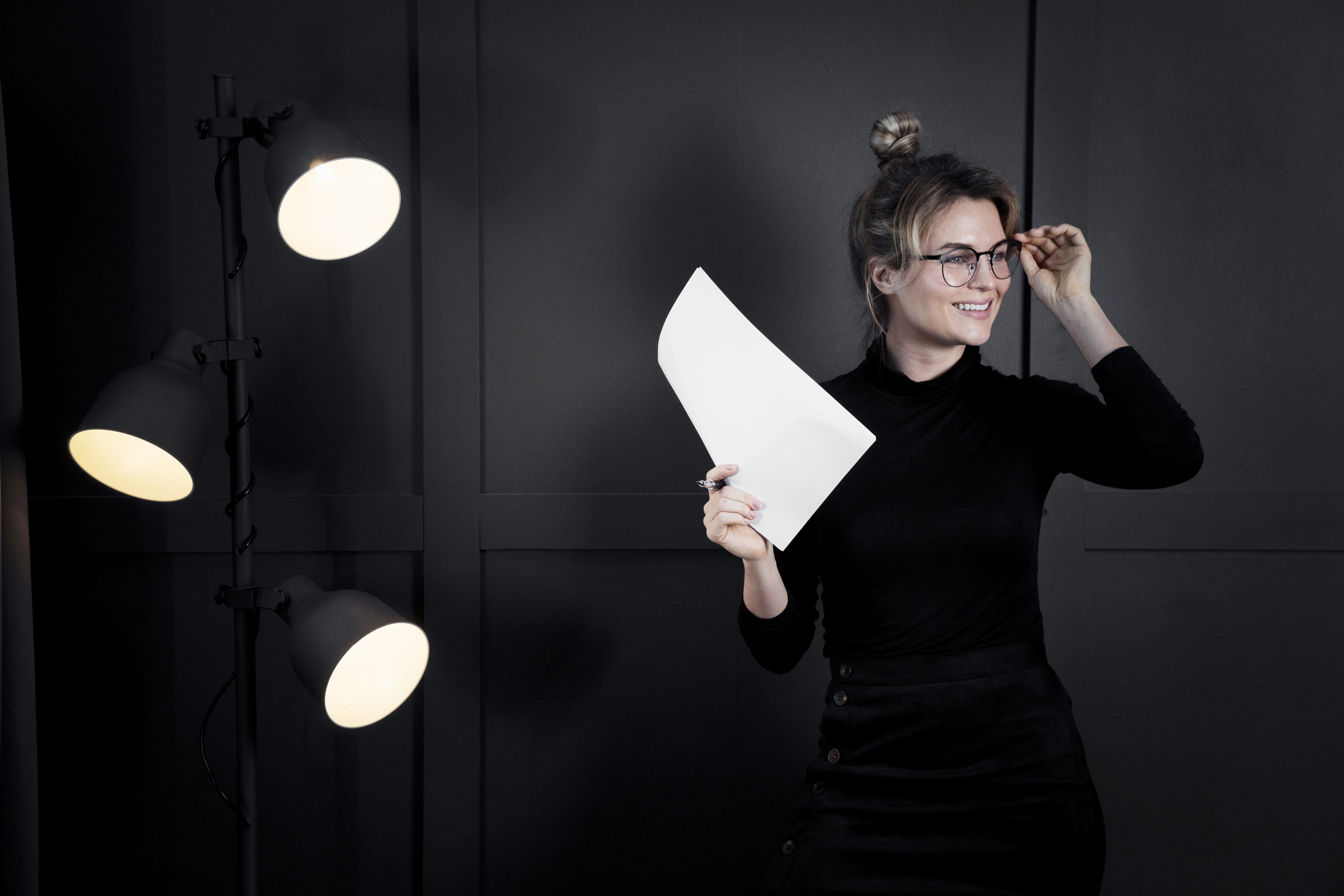 confident-businesswoman-with-eyeglasses-looking-away